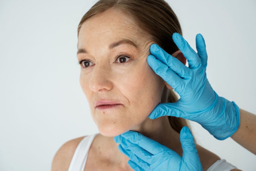 womanns face being checked after a 5 point Hydration Booster
